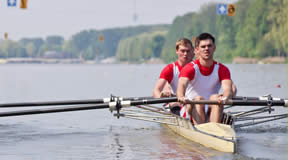 Create powerfully motivated & effective teams | Phoenix Training & Coaching 2 People Rowing | Phoenix Training & Coaching